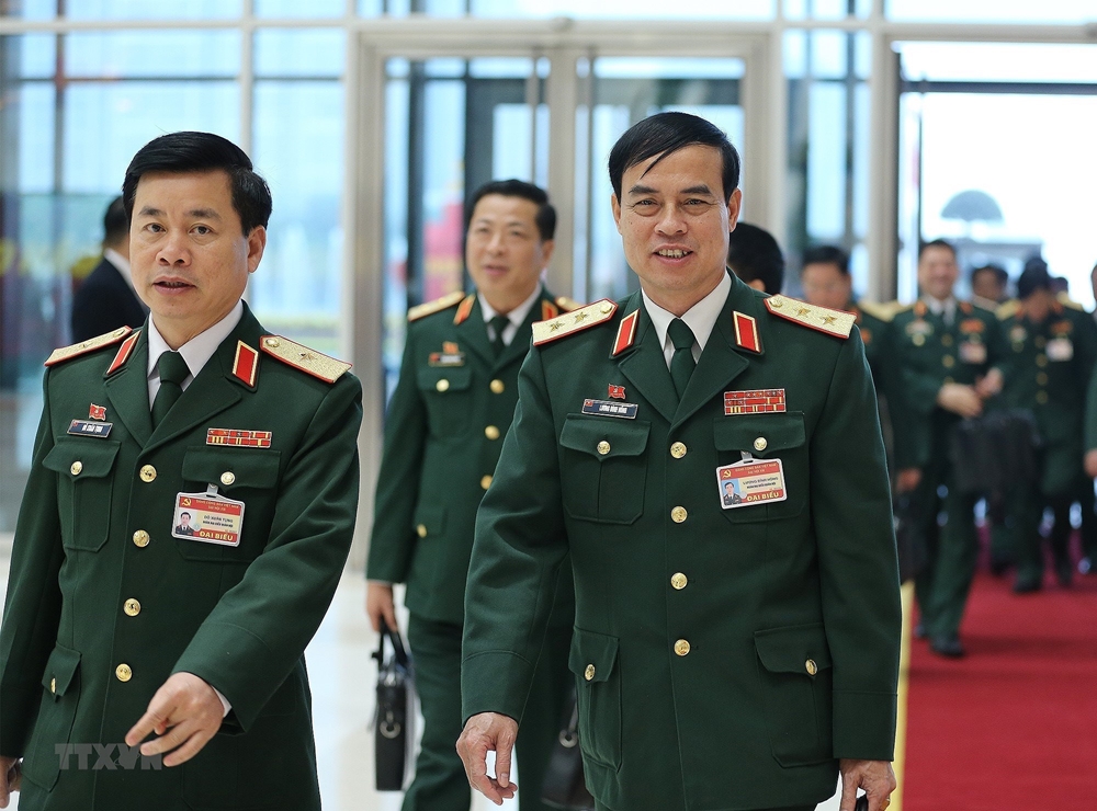 Các đại biểu Đoàn Quân đội đến dự phiên họp chiều 30-1-2021. Ảnh: TTXVN